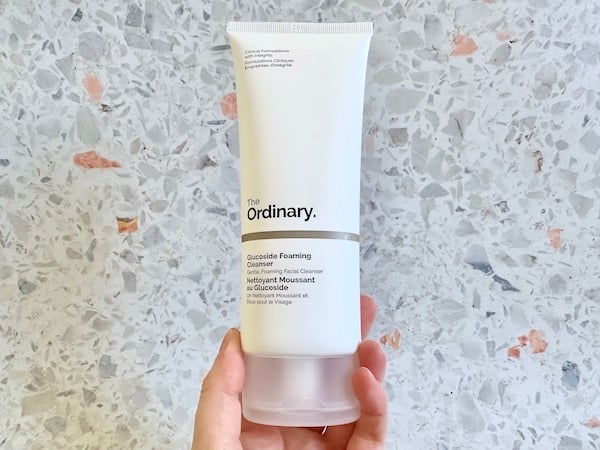 The Ordinary Glucoside Foaming Cleanser, handheld.