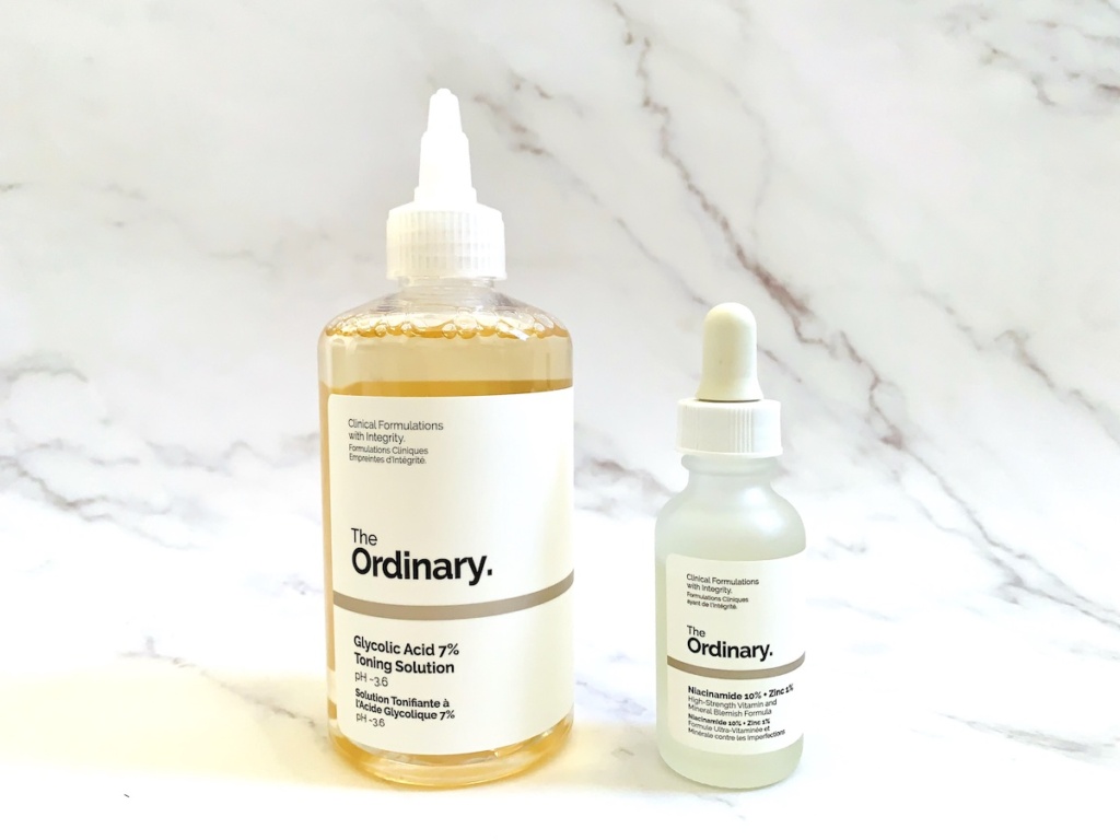 The Ordinary Glycolic Acid 7% Toning Solution and The Ordinary Niacinamide 10% + Zinc 1% on marble background