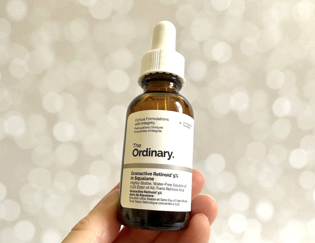 Granactive Retinoid 5% in Squalane, handheld.