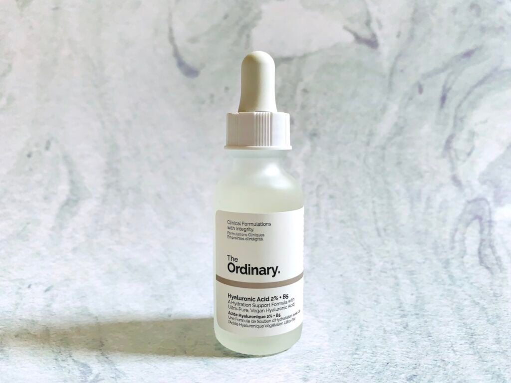 The Ordinary Hyaluronic Acid 2% + B5 Serum on a pale blue background.