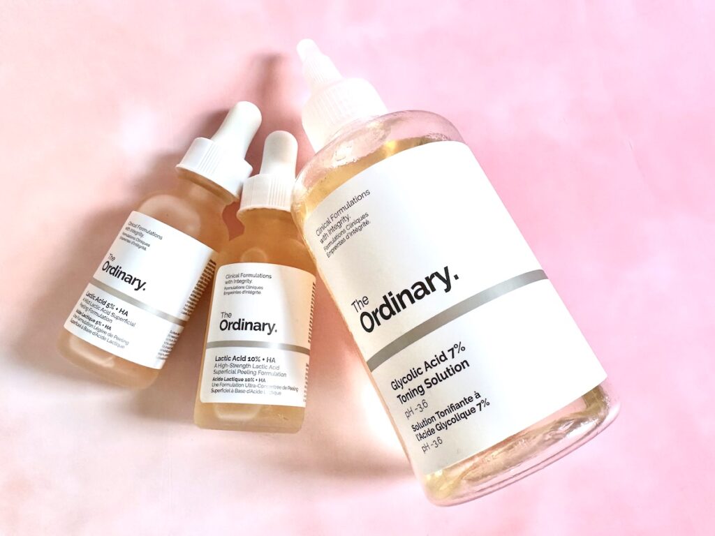 The Ordinary Lactic Acid 5% + HA, The Ordinary Lactic Acid 10% + HA. and Glycolic Acid 7% Toning Solution, flatlay.