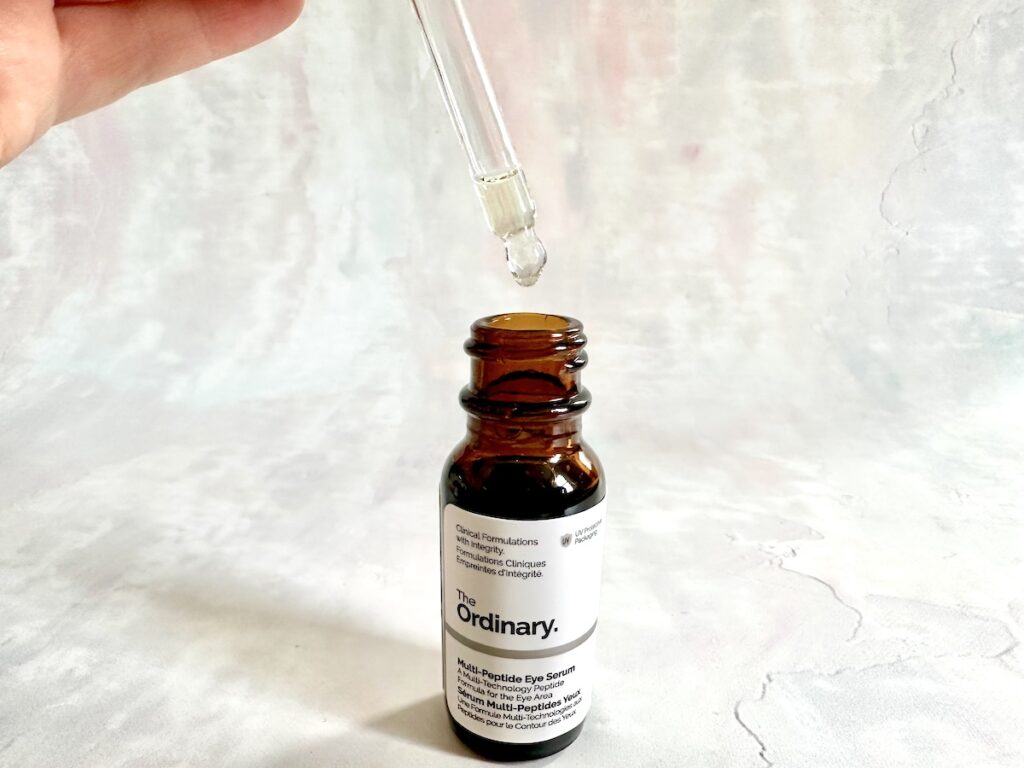 The Ordinary Multi-Peptide Eye Serum, open with dropper.