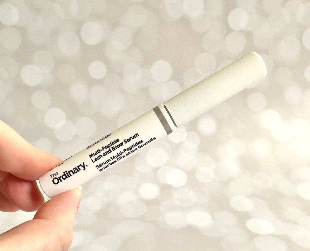 The Ordinary Multi-Peptide Lash and Brow Serum, handheld.