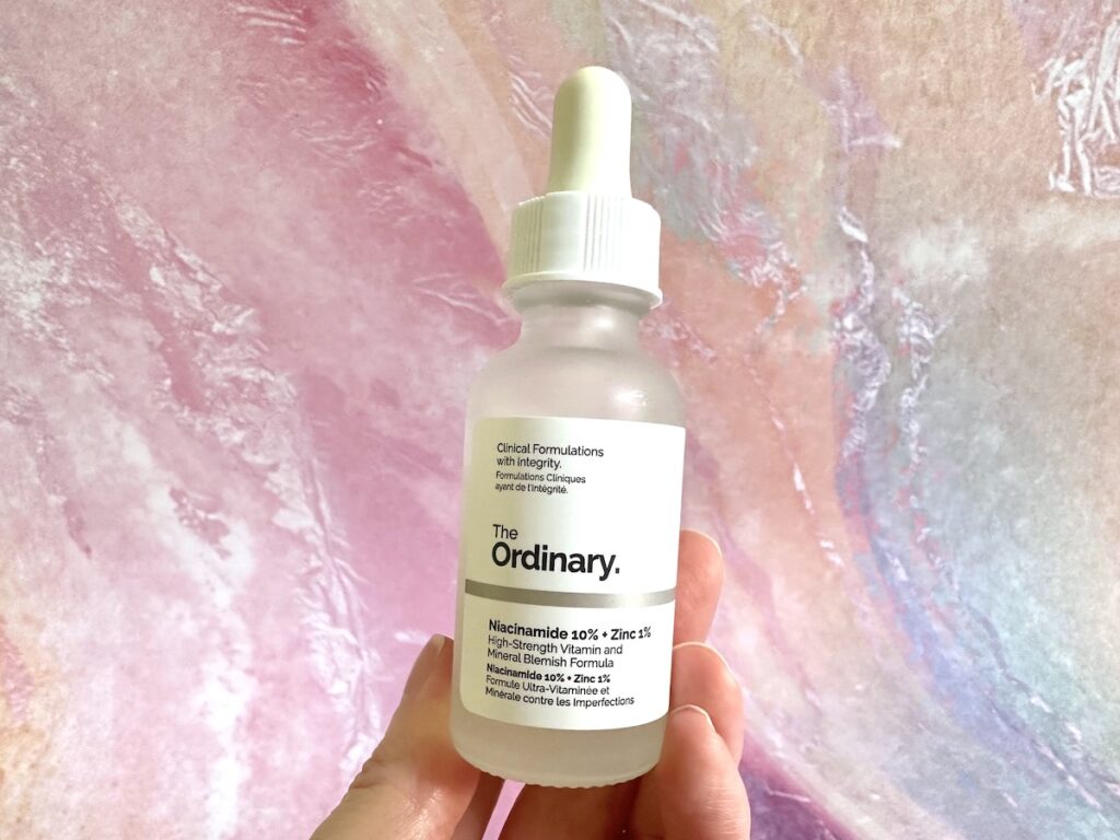 The Ordinary Niacinamide 10% + Zinc 1%, handheld.