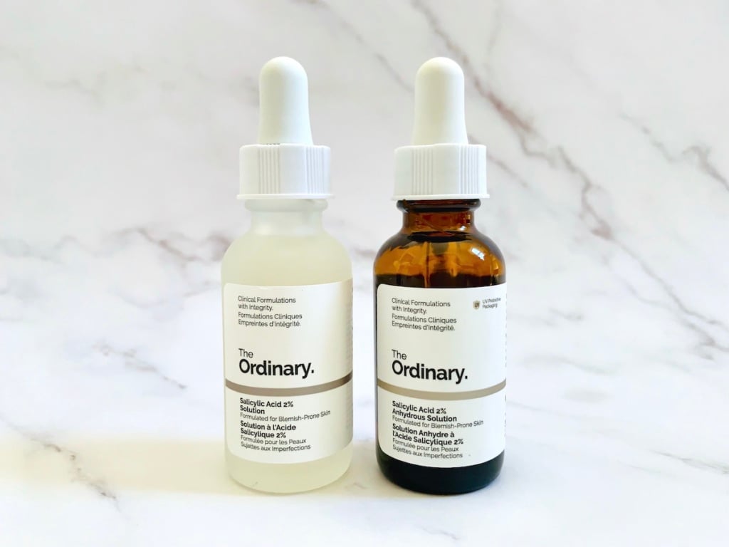 The Ordinary Salicylic Acid 2% Solution and The Ordinary Salicylic Acid 2% Anhydrous Solution on white marble background