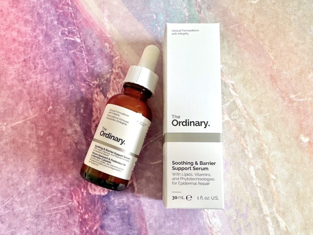 The Ordinary Soothing & Barrier Support Serum, flatlay of serum bottle at angle next to box.