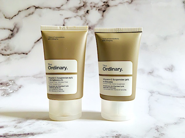 The Ordinary Vitamin C Suspension 23% + HA Spheres 2% and The Ordinary Vitamin C Suspension 30% in Silicone on marble background.