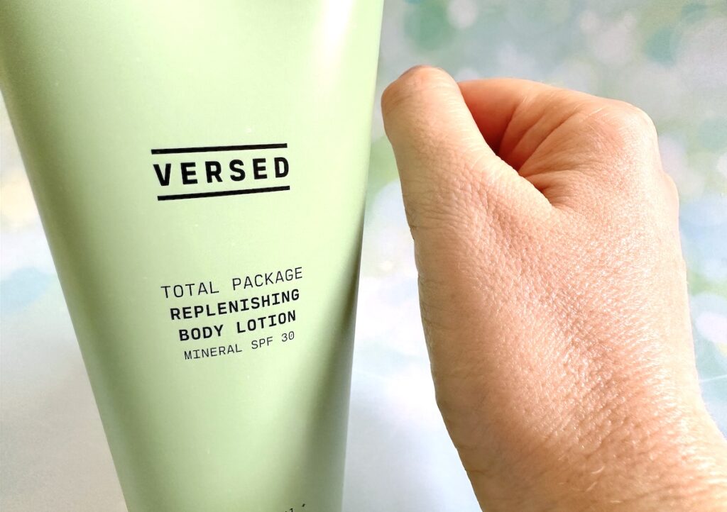 Versed Total Package Replenishing Body Lotion Mineral SPF 30, tube next to sample on hand, absorbed.