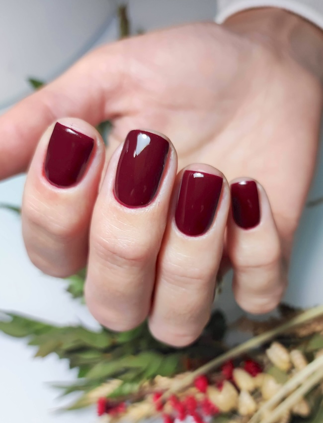 Burgundy wine red nails.