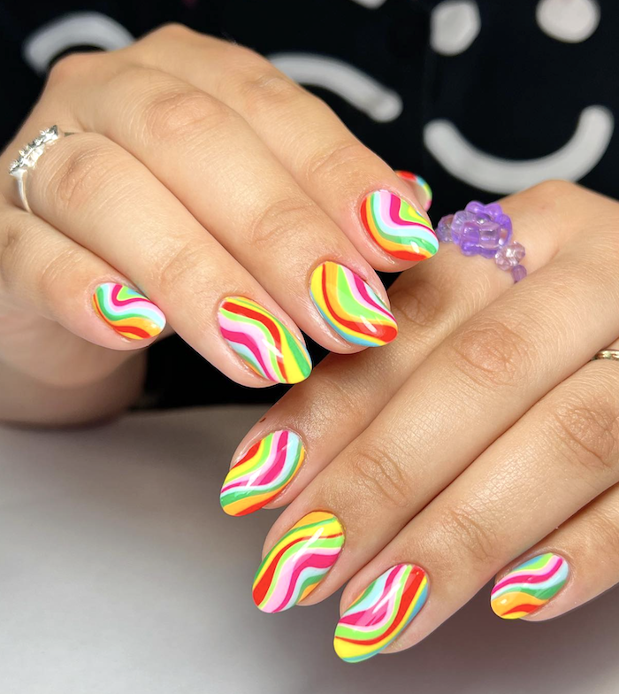 Bright swirl nails.