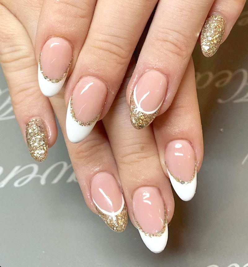 Bold shimmer and white French tip nails for winter.