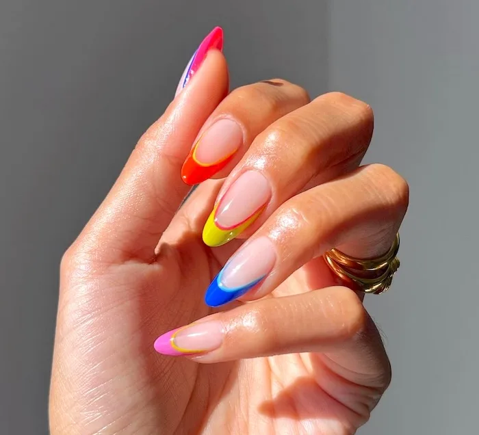 Bright French tip nails for the month of May.