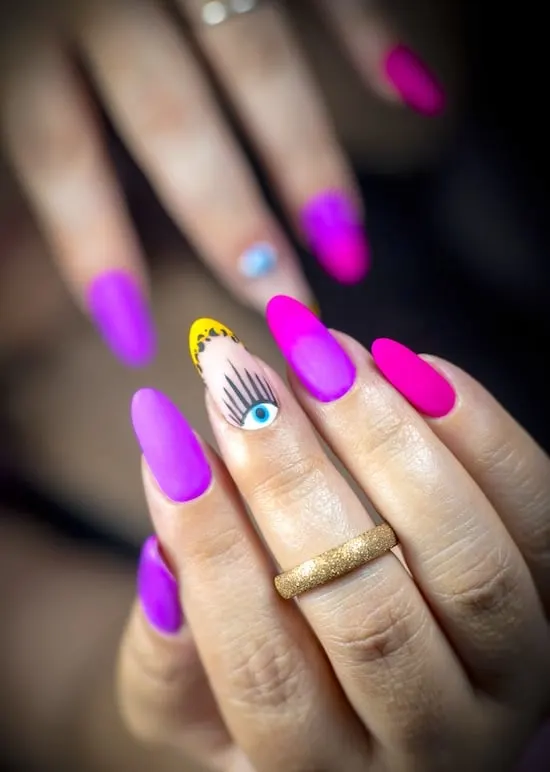 Bright purple eye nail art summer nails.