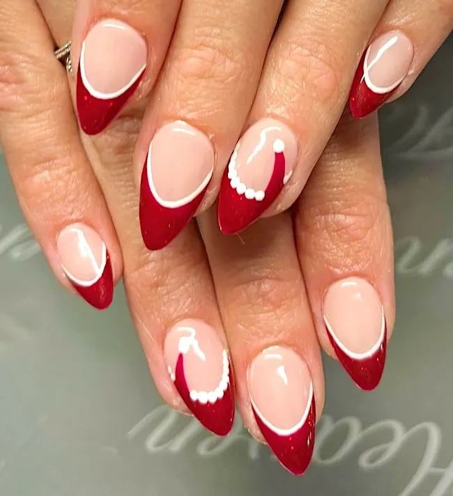 Christmas holiday French tip nails.