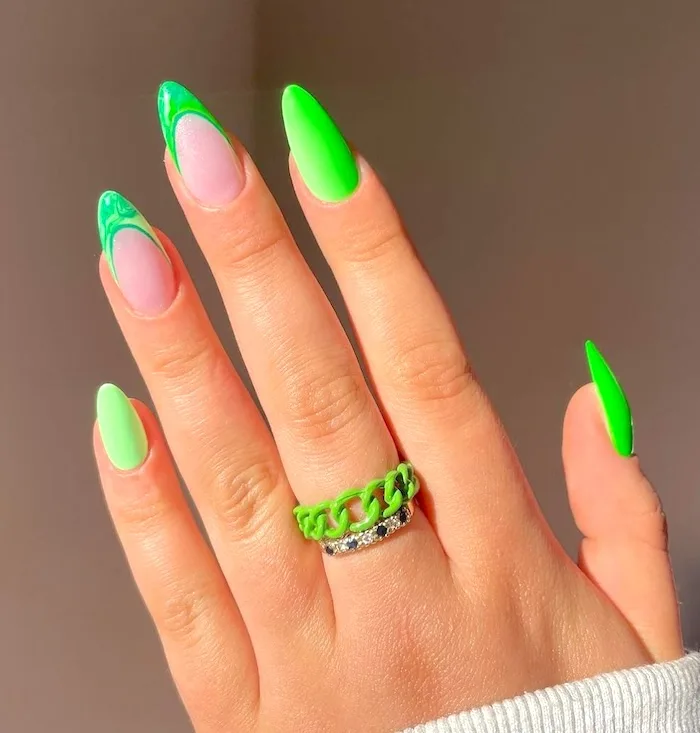 Neon green almond nails.