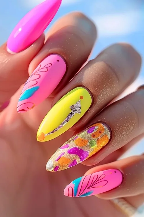 Neon nail art on bright summer nails.