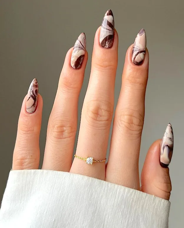 Brown marble nails.