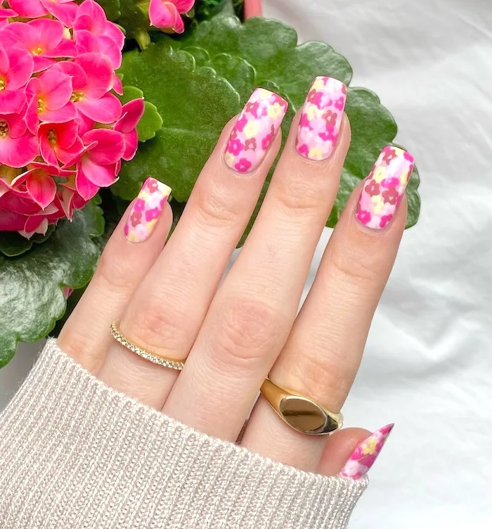 Multi-color floral April nails.