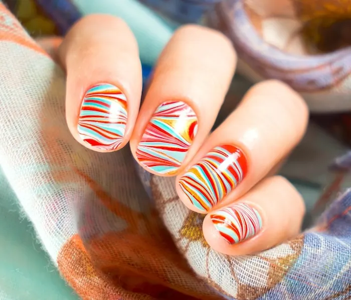 Bright multi-color short nails for summer.