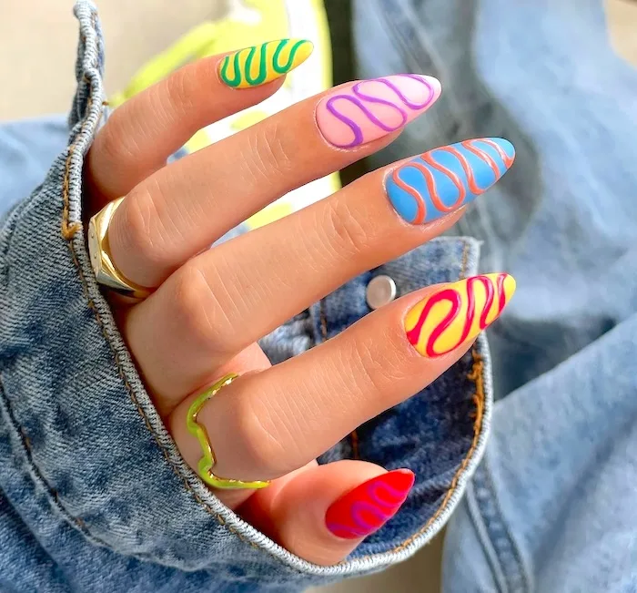 Bright swirl summer nails.