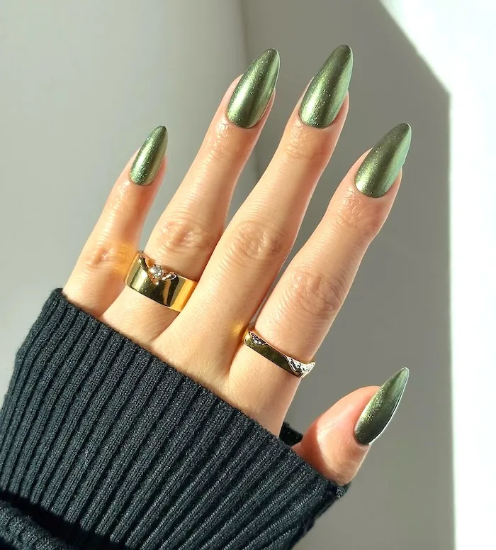 Olive green chrome nails.