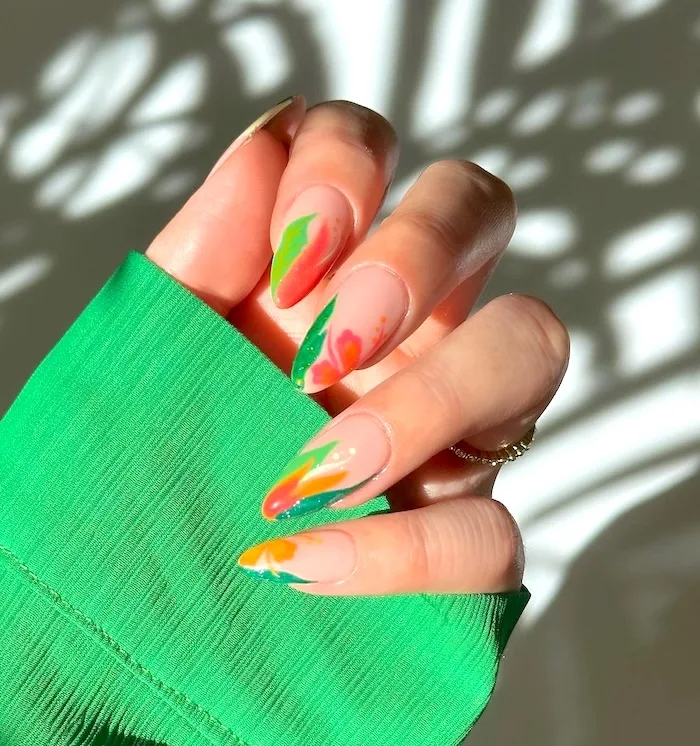 Orange green May nails.