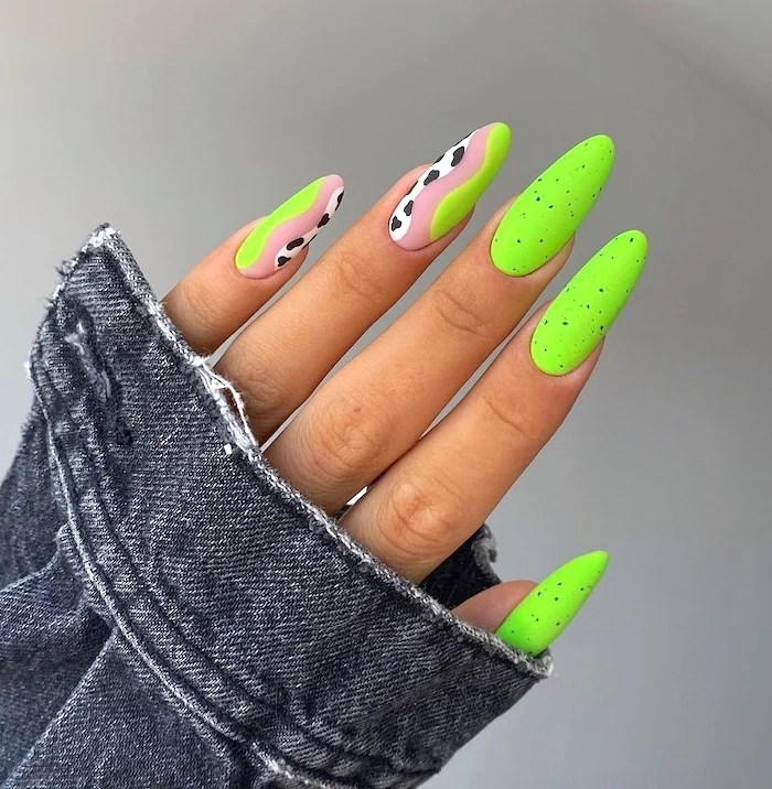 Neon green speckled nails.