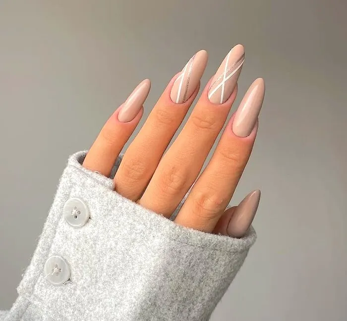 Nude abstract minimalist nails.