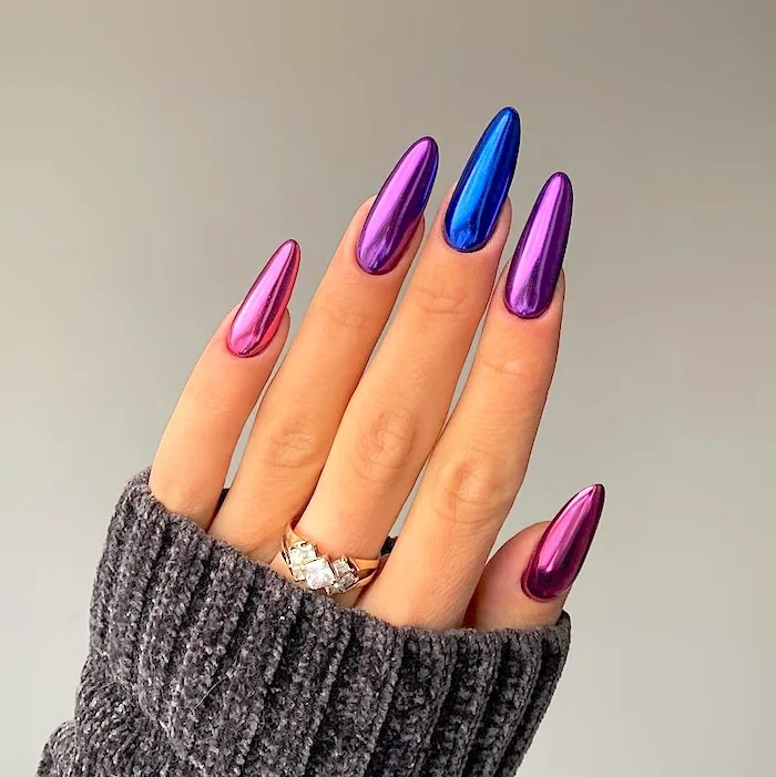 Purple and blue chrome nails.