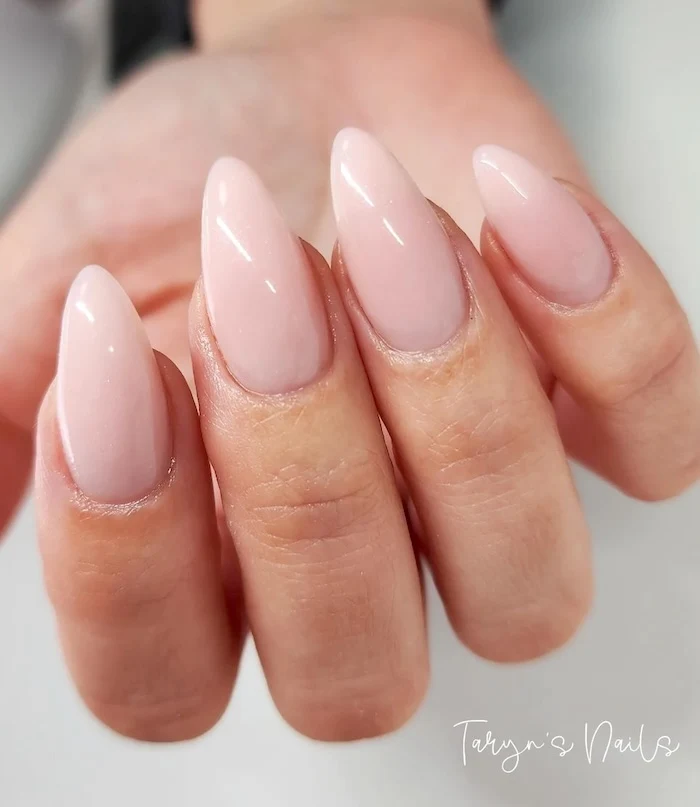 Pink almond minimalist nails.