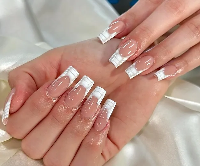 Crocodile French tip manicure.