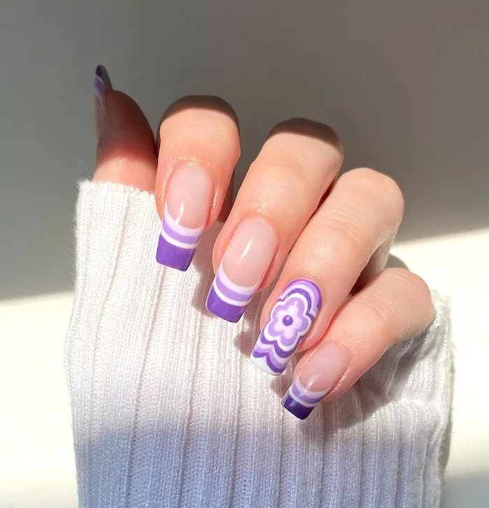 Purple April French tip nails.