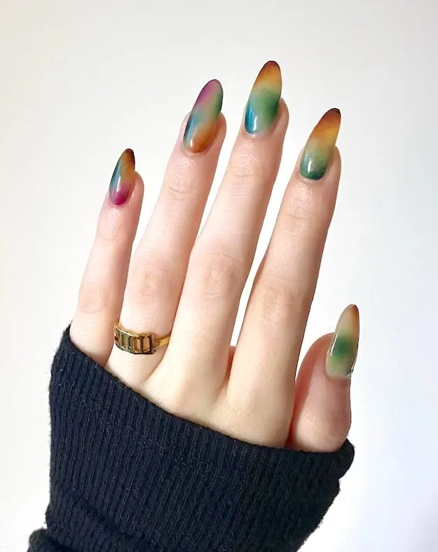 Multi-color fall almond nails.