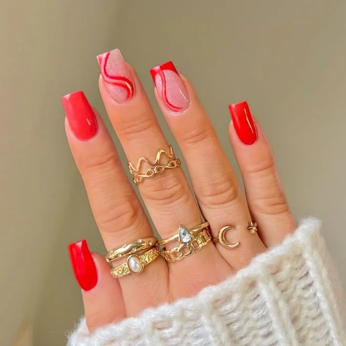 Red swirl nails.