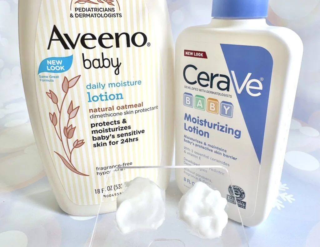 Aveeno Baby Daily Moisturizing Cream and CeraVe Baby Moisturizing Lotion, with samples on clear spatula palette.