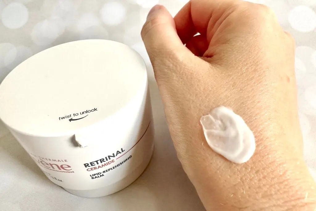 Avene RetrinAL Ceramide Lipid-Replenishing Balm, jar next to sample on hand.