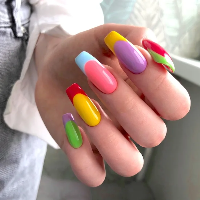 Bright colorful summer French tip nails.