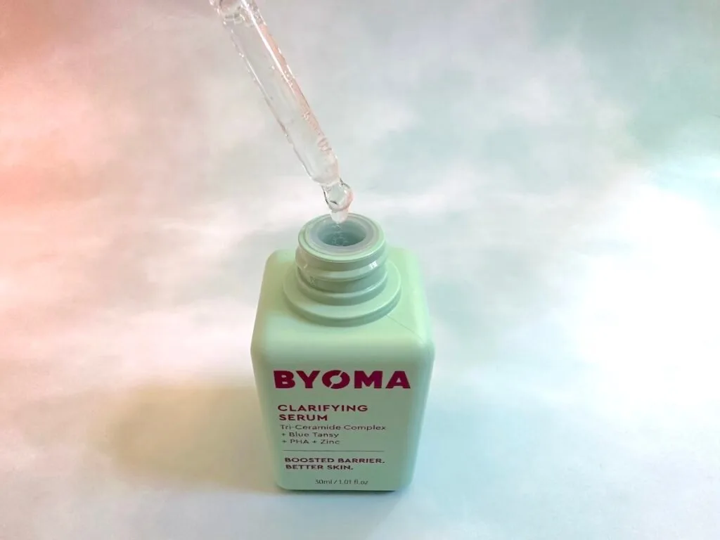 Byoma Clarifying Serum open bottle with dropper.