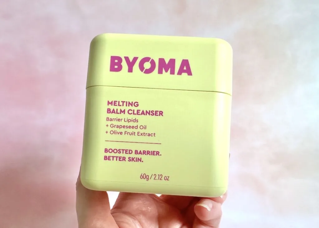 Byoma Melting Balm Cleanser, handheld.