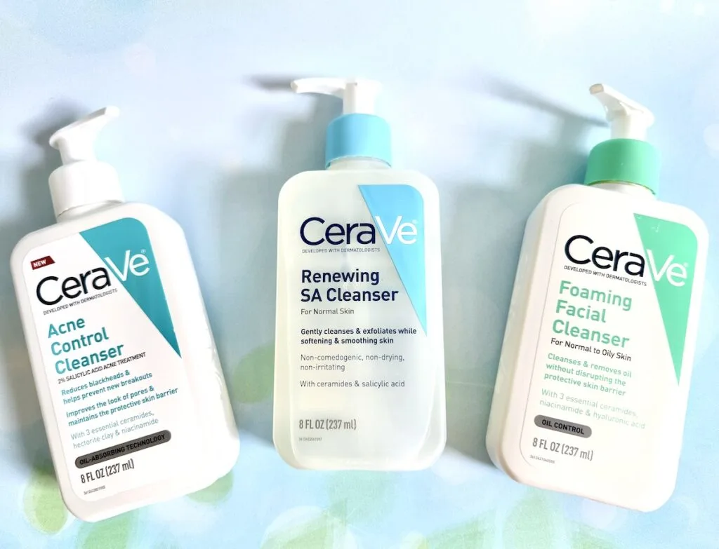 Flatlay of CeraVe Acne Control Cleanser, CeraVe Renewing SA Cleanser, and CeraVe Foaming Facial Cleanser.