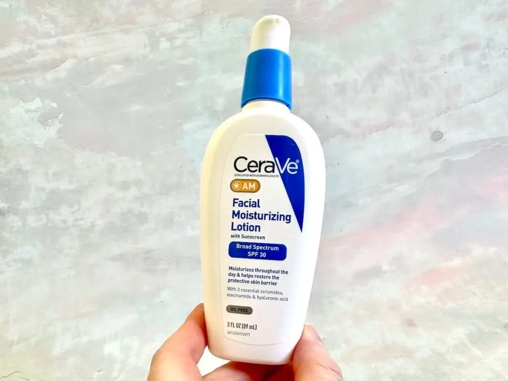 CeraVe AM Facial Moisturizing Lotion with Sunscreen, handheld.