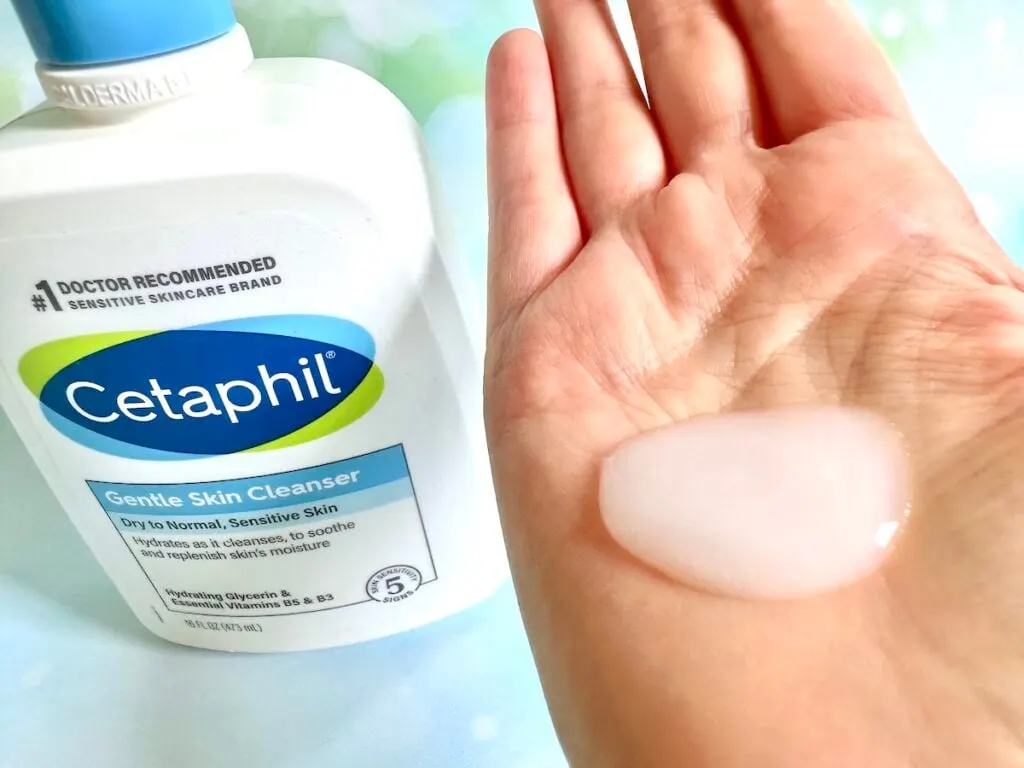 Cetaphil Gentle Skin Cleanser bottle next to sample of gel cream in palm of hand.