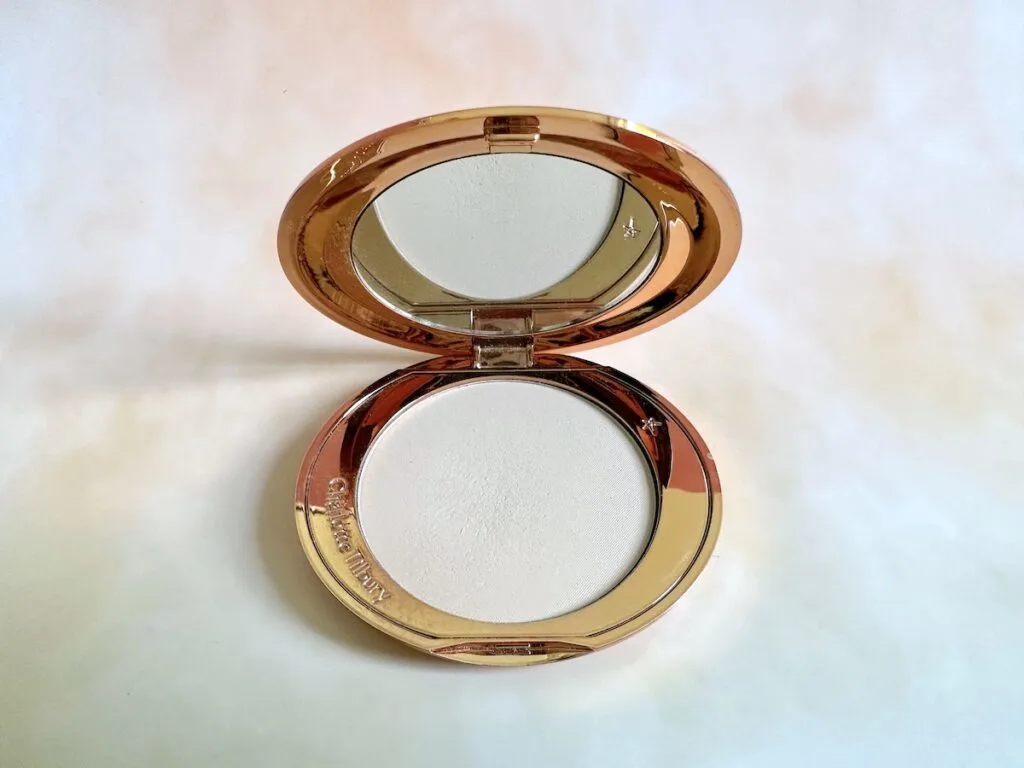 Charlotte Tilbury Airbrush Flawless Finish Setting Powder in the shade Fair, open compact.