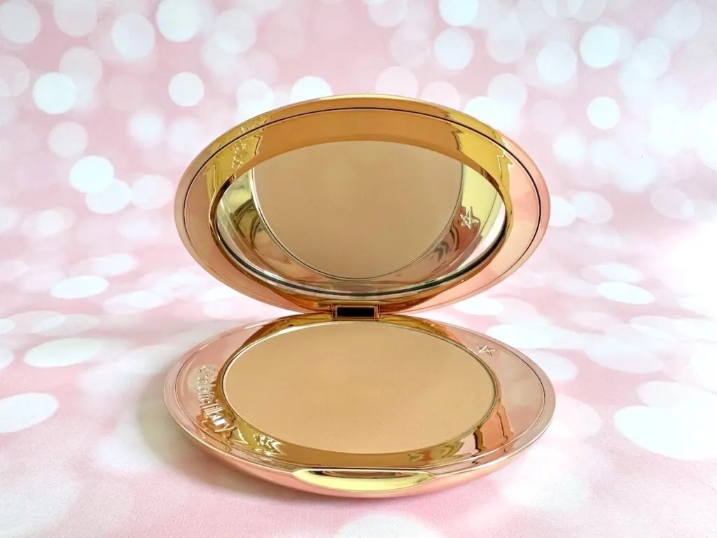 Charlotte Tilbury Airbrush Matte Bronzer in the shade Medium. Open compact.