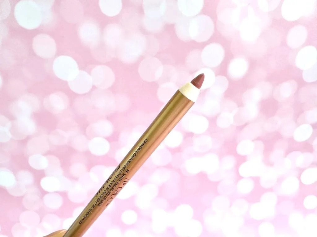 Charlotte Tilbury Lip Cheat Lip Liner in Pillow Talk, handheld.