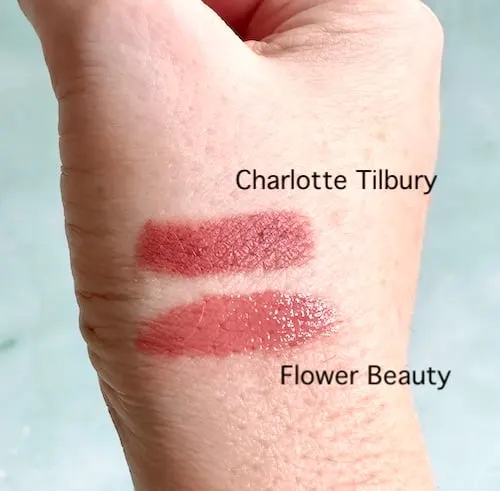 Charlotte Tilbury Pillow Talk Lipstick and Flower Beauty Perfect Pout Moisturizing Lipstick in Buttercup, sampled on hand.