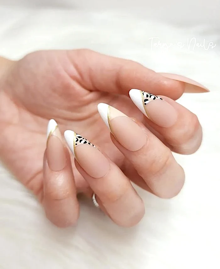 Nude cheetah French tip nails.