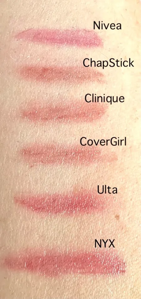 Clinique Black Honey dupes from Nivea, ChapStick, CoverGirl, Ulta Beauty, and NYX, swatched on arm.