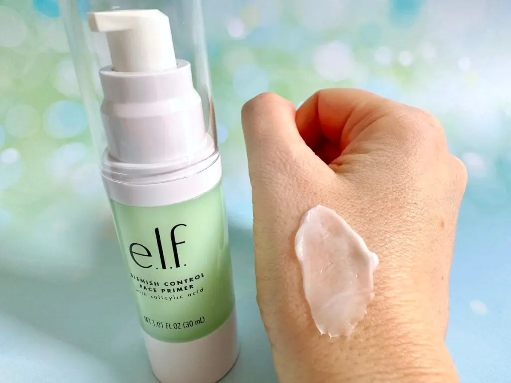 e.l.f. Blemish Control Face Primer bottle next to sample on hand.