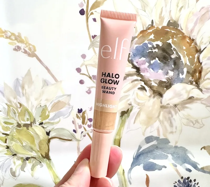 e.l.f. Halo Glow Highlight Beauty Wand in the shade Liquid Gold, handheld.